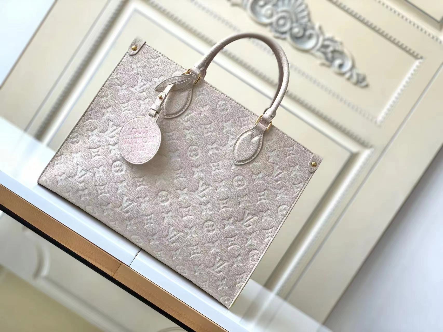 Louis Vuitton M OnTheGo M Bag - Image 8